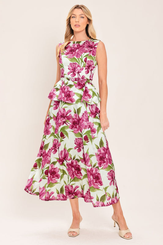 a woman in a floral dress