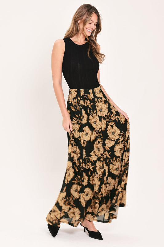 a woman in a long floral skirt