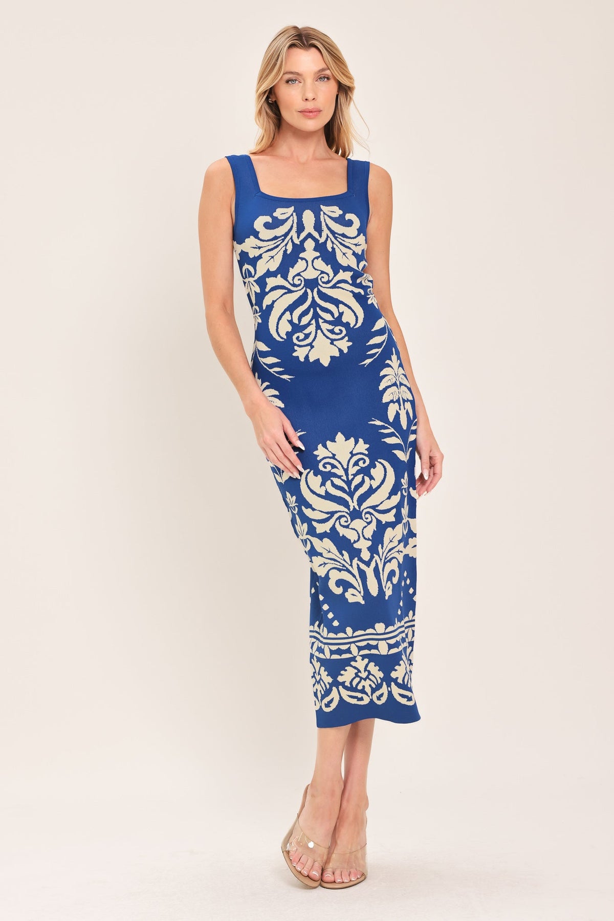 a woman in a blue dress