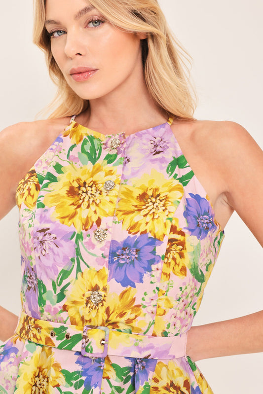 a woman wearing a floral dress