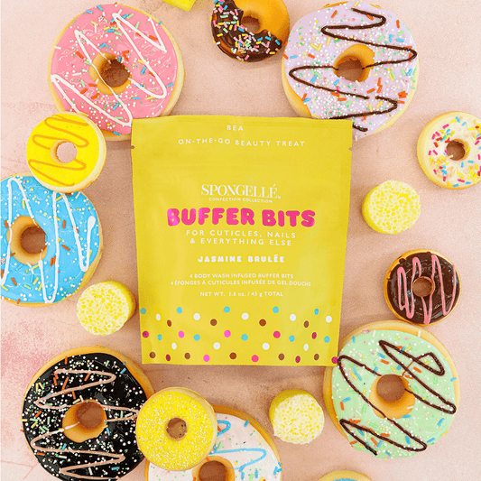 a group of donuts with a bag of butter bits