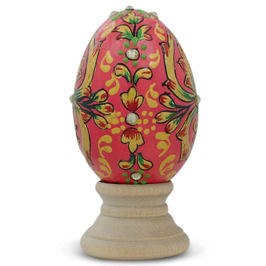 a painted egg on a stand