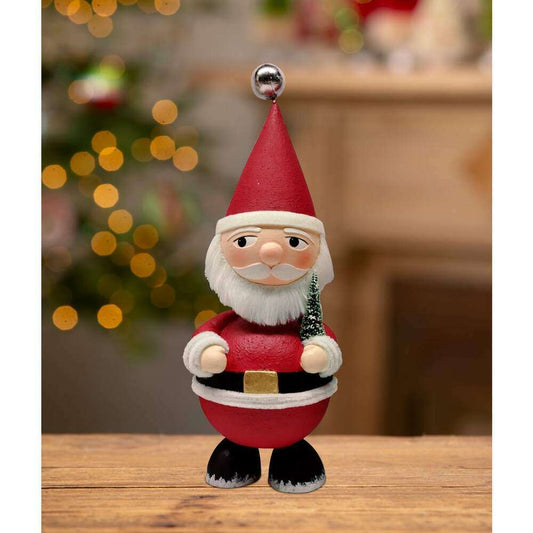 a small figurine of a santa claus
