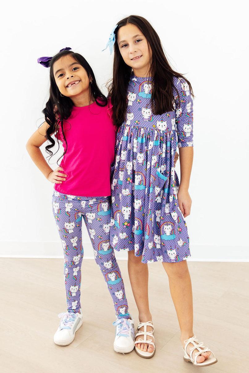 two girls posing for a picture