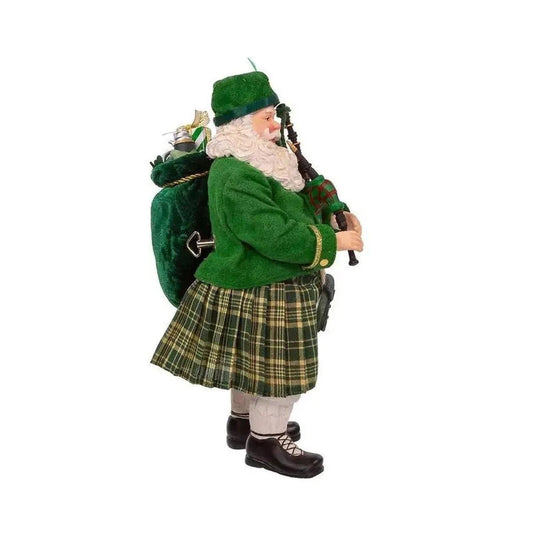 a figurine of a man in a green outfit