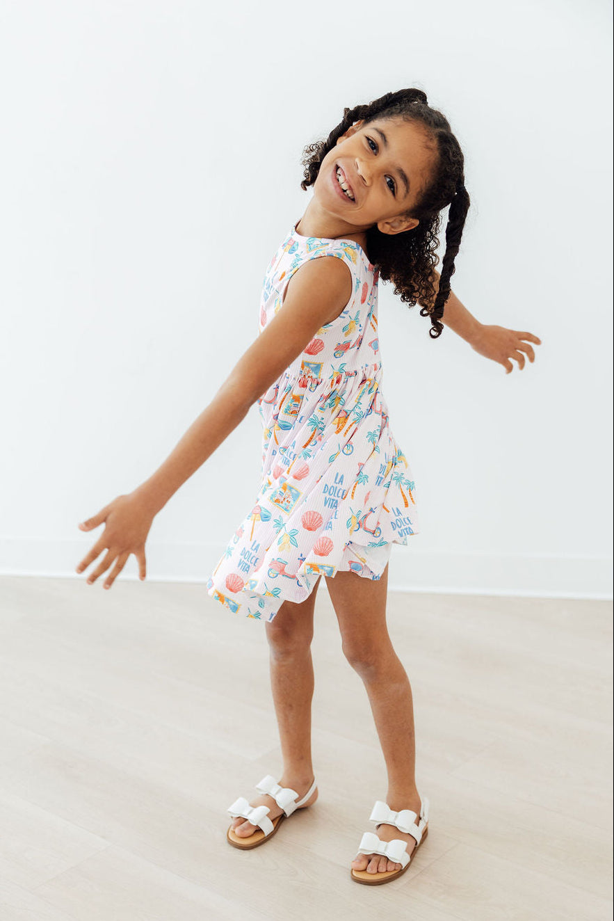 a girl in a dress