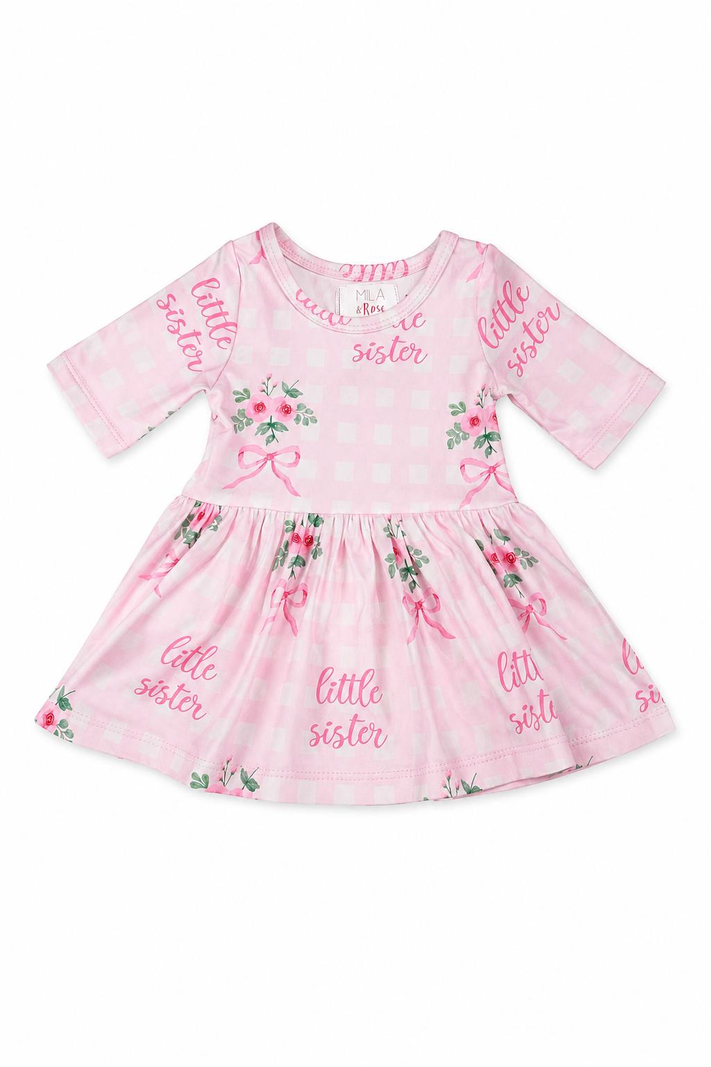 a pink dress with flowers on it