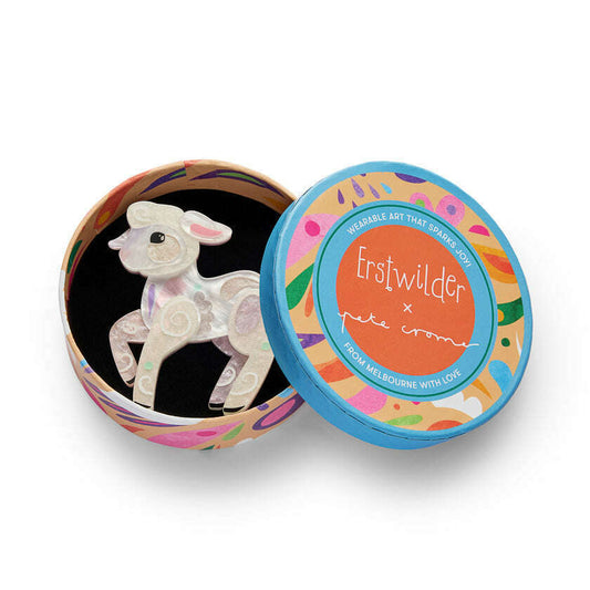 a small animal in a round box