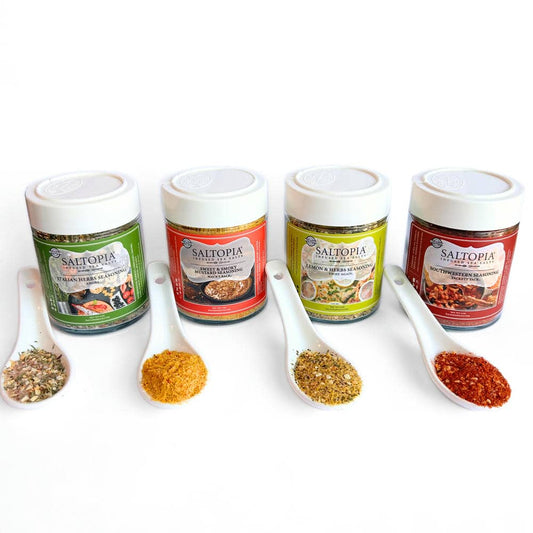 a group of containers with different spices in them