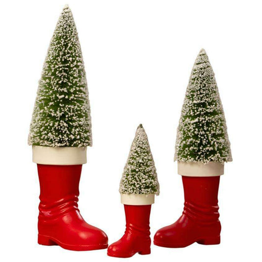 a group of christmas trees in boots