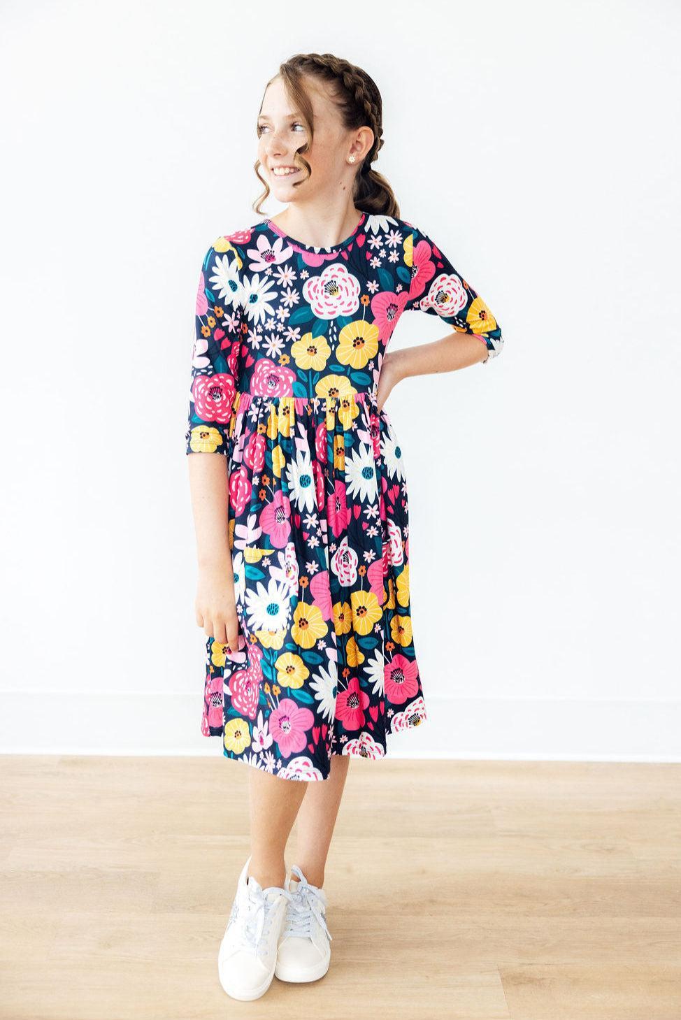 a girl in a dress