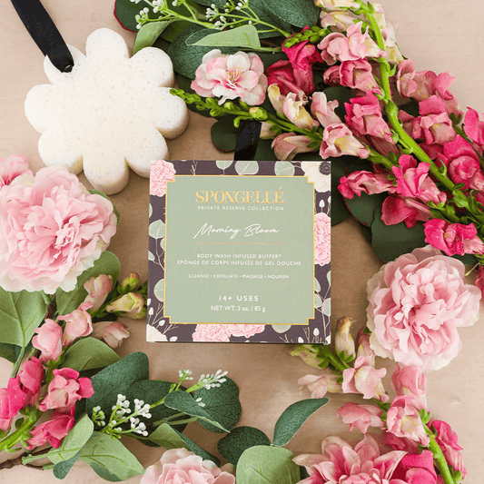 a flower wreath with a tag and a card