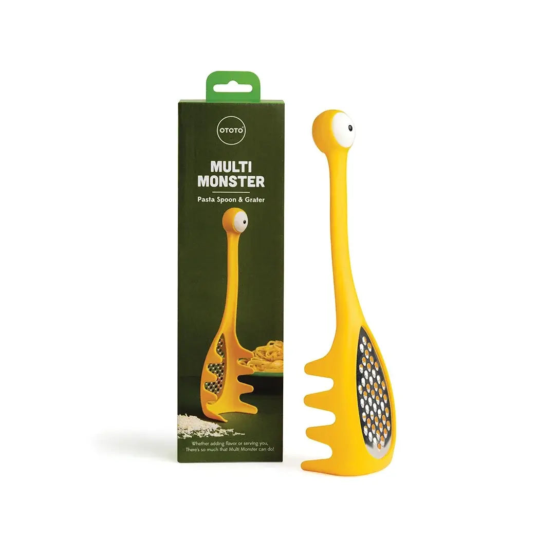 a yellow monster shaped kitchen utensil