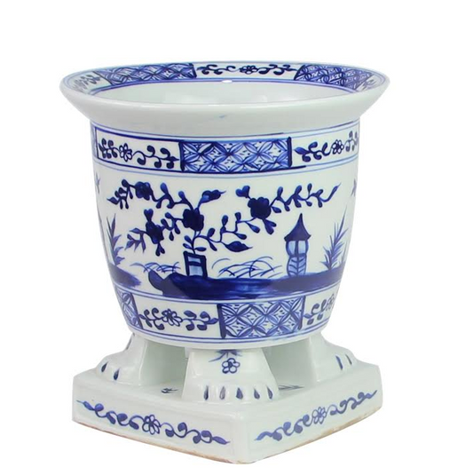 a blue and white vase