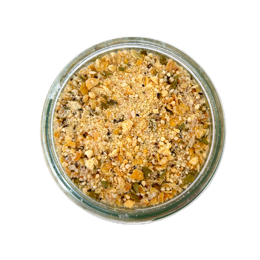a jar of food with crumbs