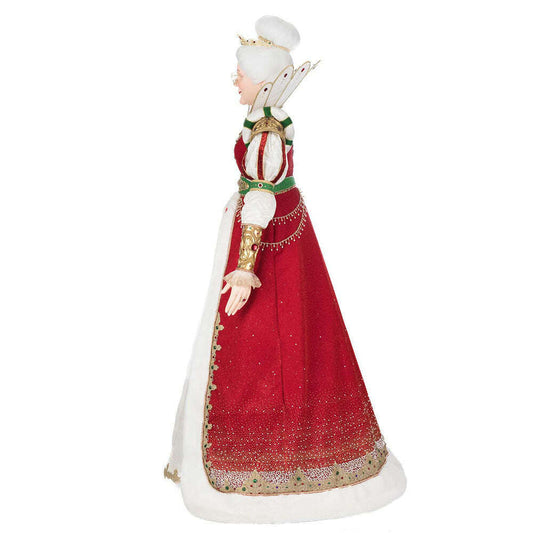a statue of a woman in a red and white dress