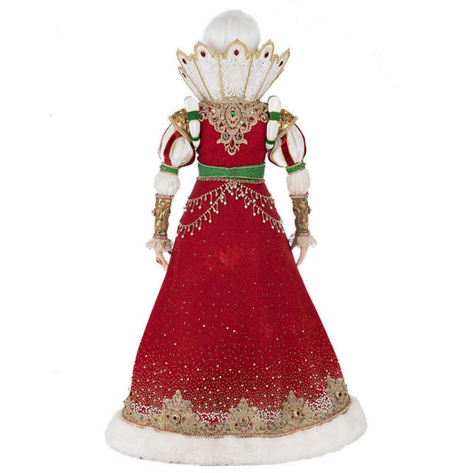 a doll in a red dress