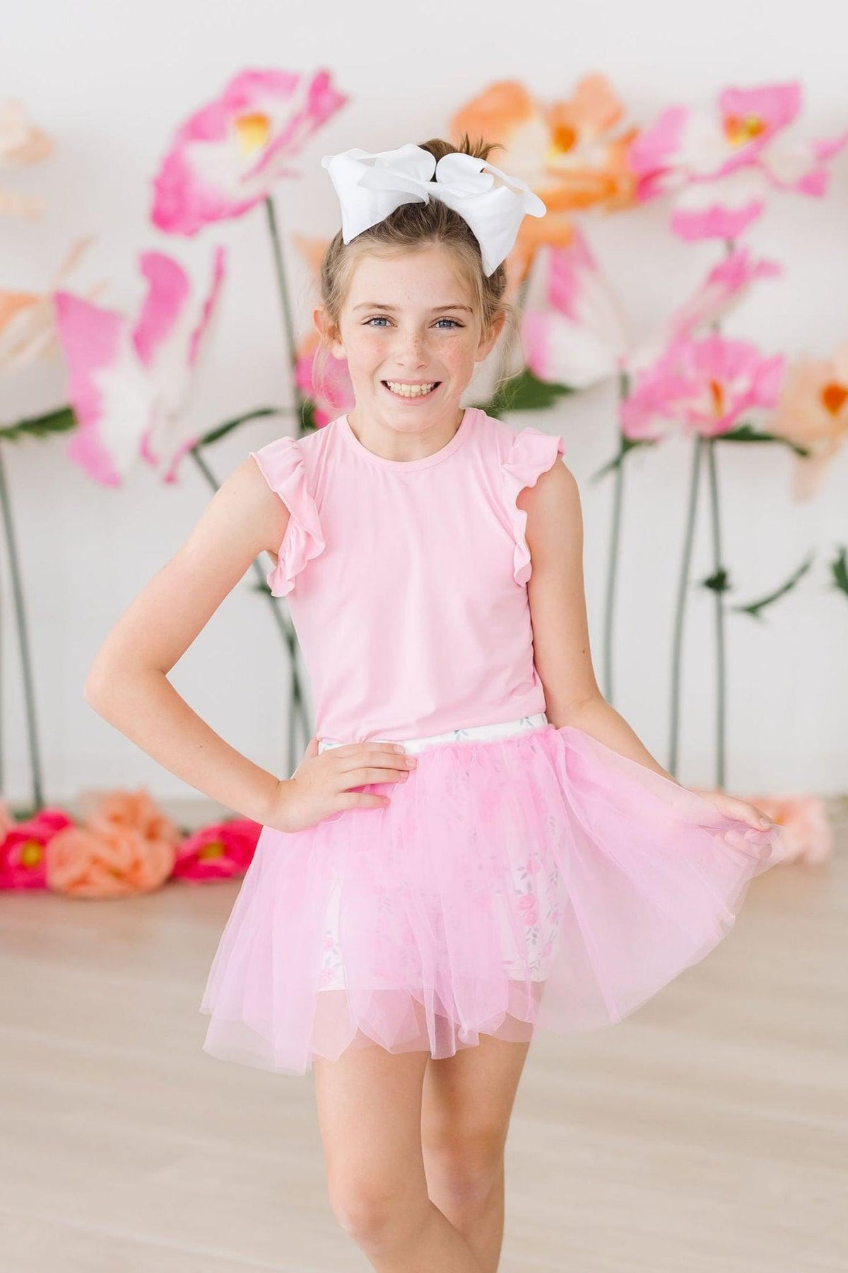 a girl in a pink dress