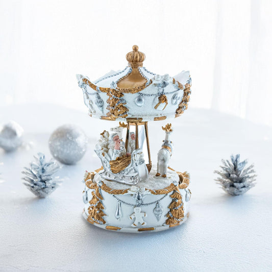 a carousel with silver and gold decorations