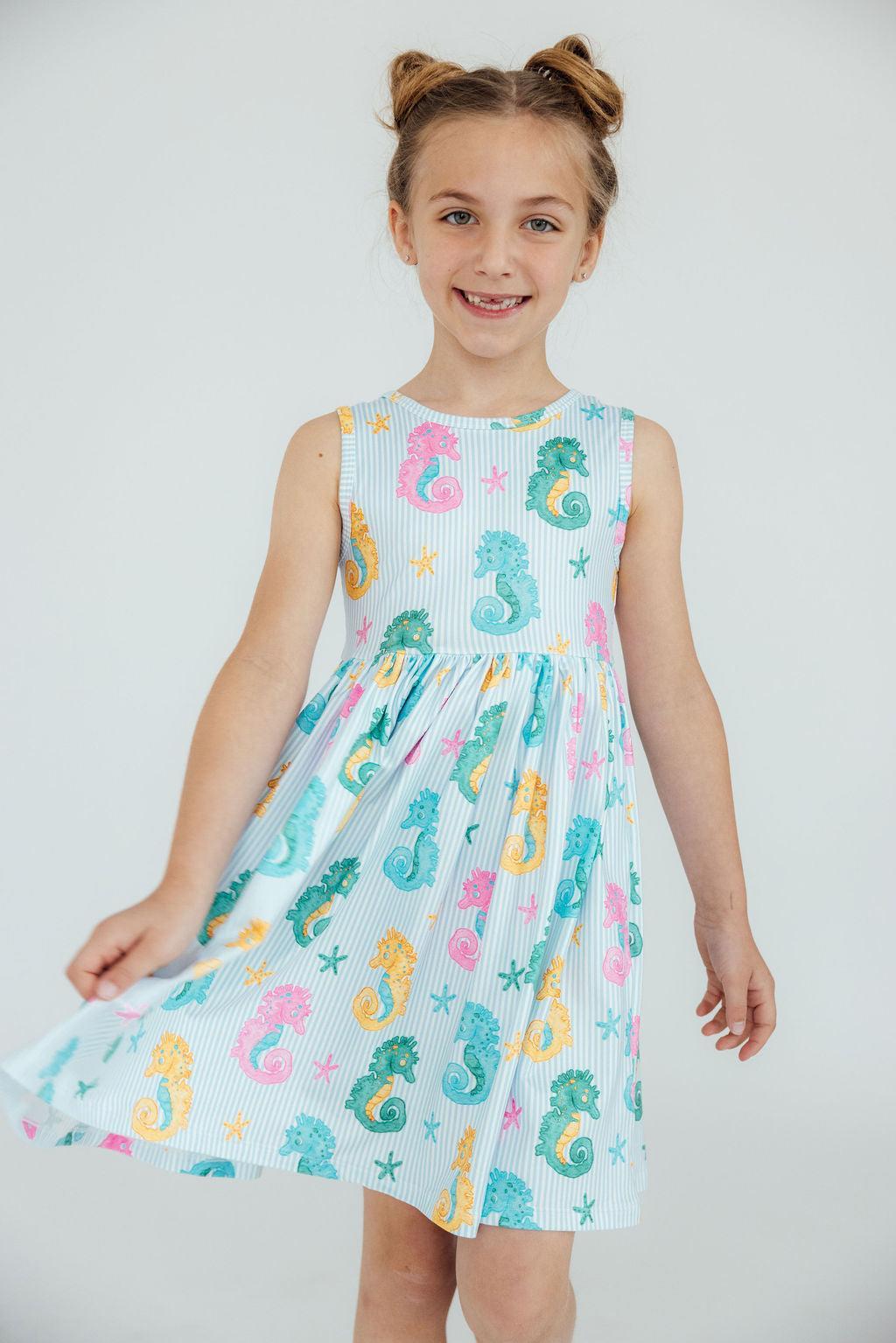a girl in a dress