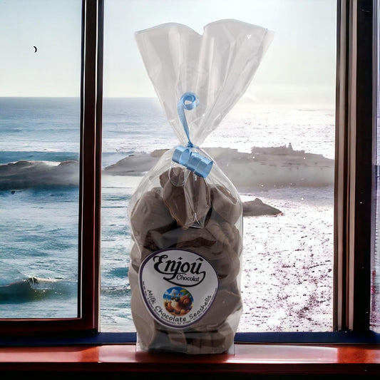 a bag of chocolates on a window sill