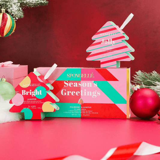 a group of christmas ornaments on a red surface