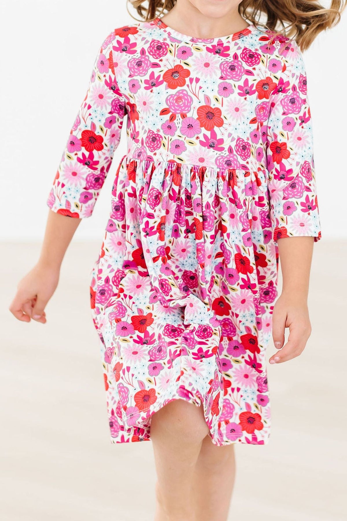 a girl wearing a dress