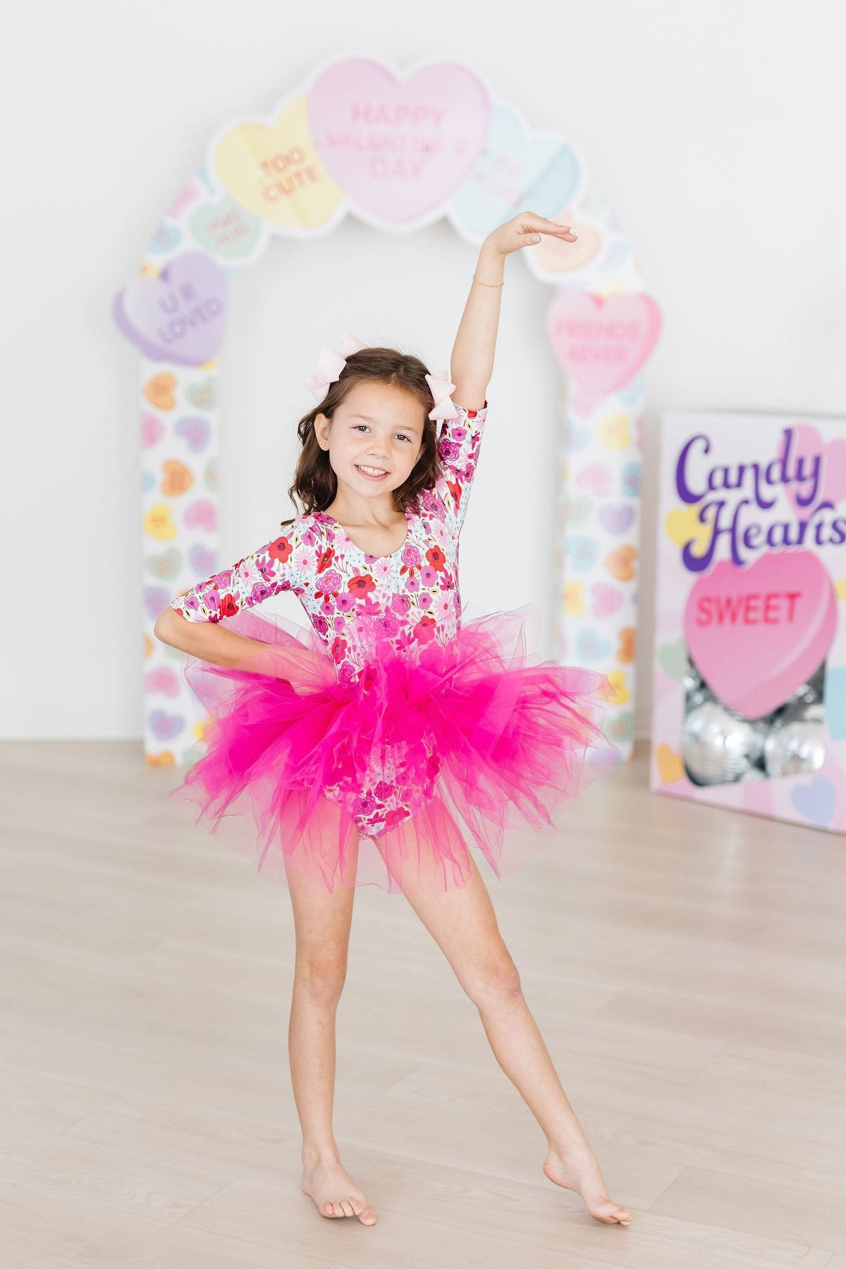 a girl in a pink tutu