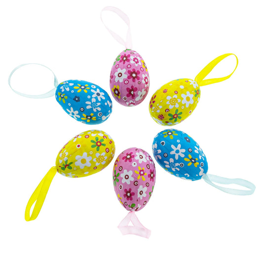 a group of colorful eggs with ribbons