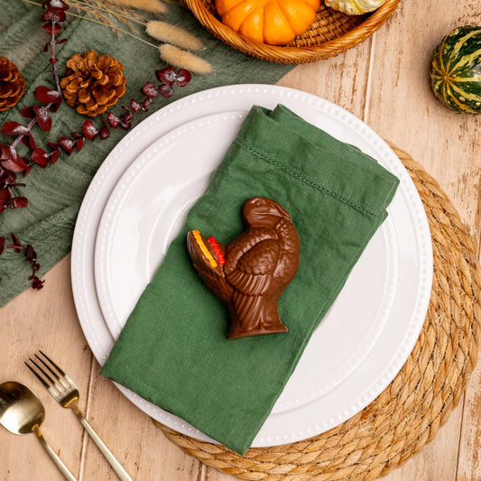 a plate with a chocolate bird on it