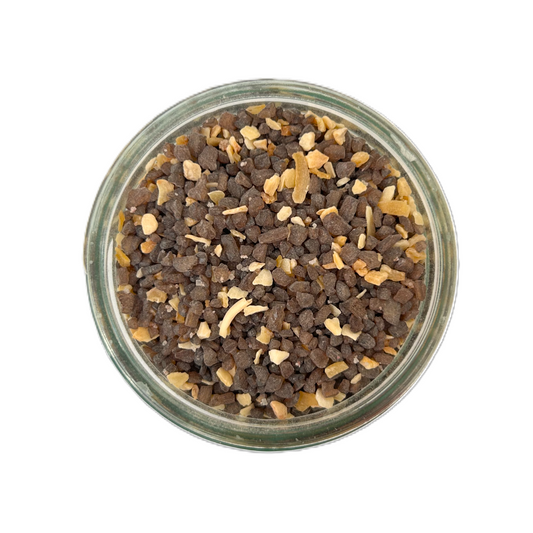 a bowl of brown and white crushed stones