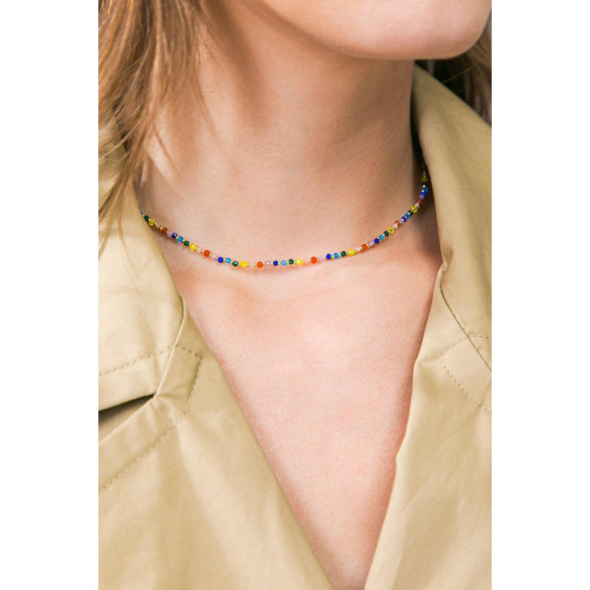 a woman wearing a necklace