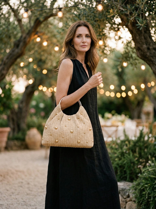 Artisanal Studded Handwoven Raffia Bag with Sculptural Gold Ring Handle