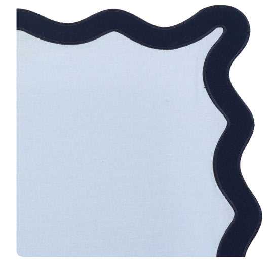 a white and black cloth with black edge