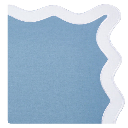 a close up of a blue and white cloth