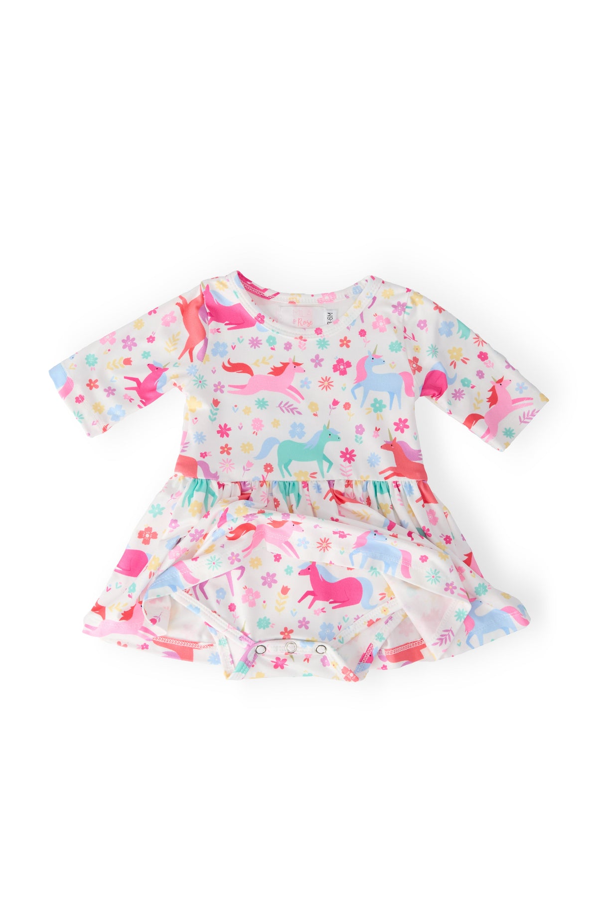 a baby dress with unicorns on it