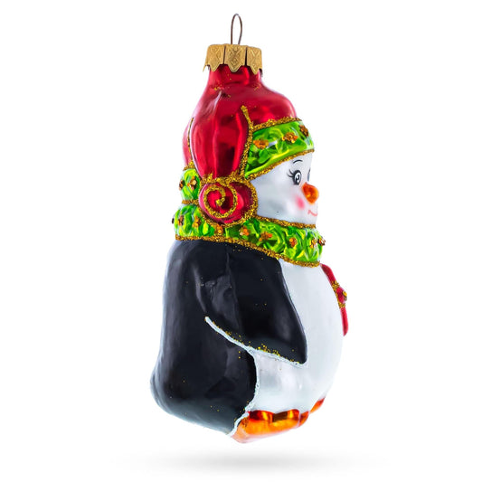 a christmas ornament with a penguin