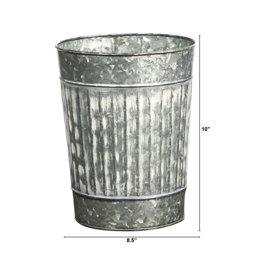 a metal container with a small pattern