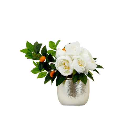 a white flowers in a silver pot