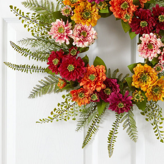 a wreath of flowers on a door