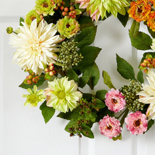 a wreath of flowers on a door