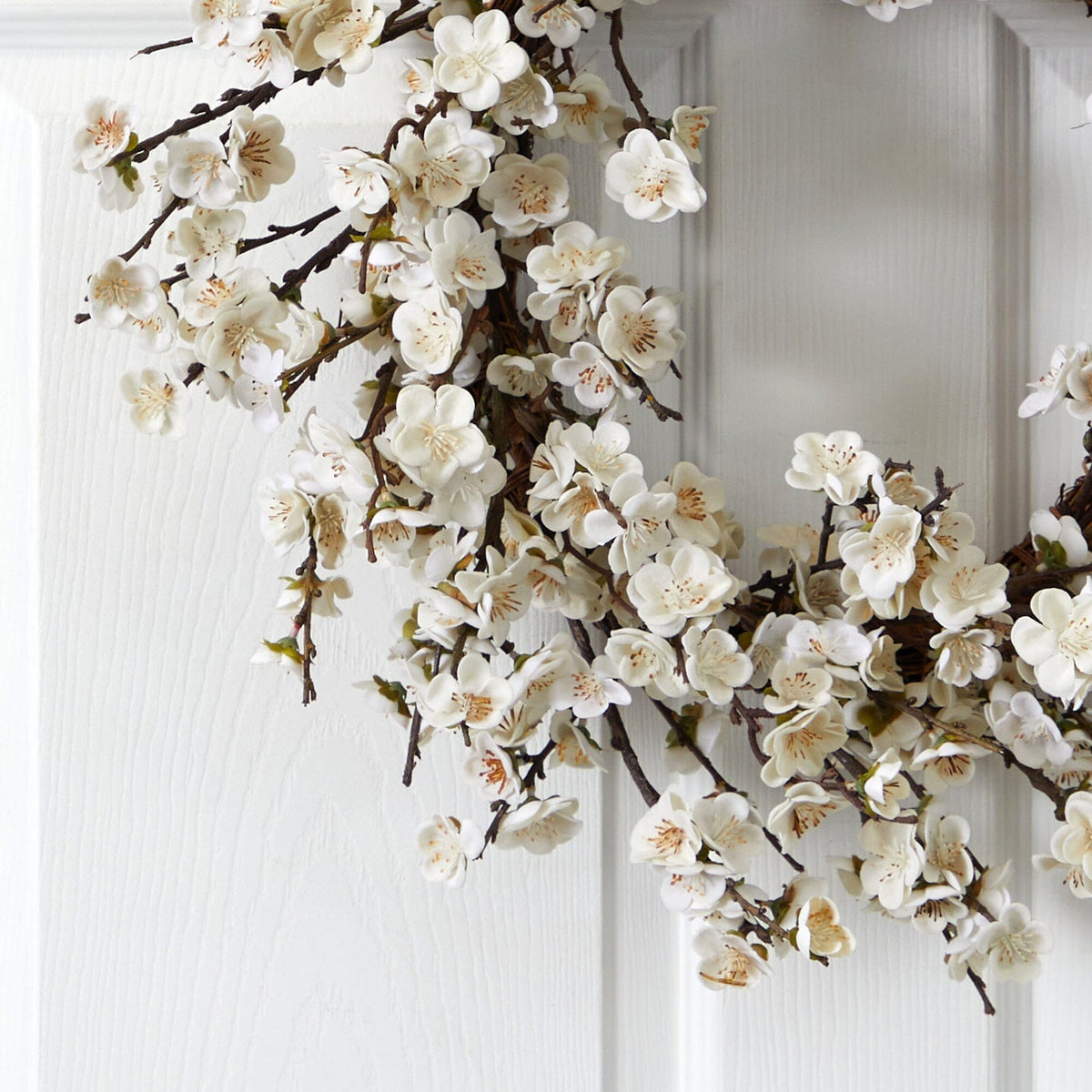 a wreath with white flowers