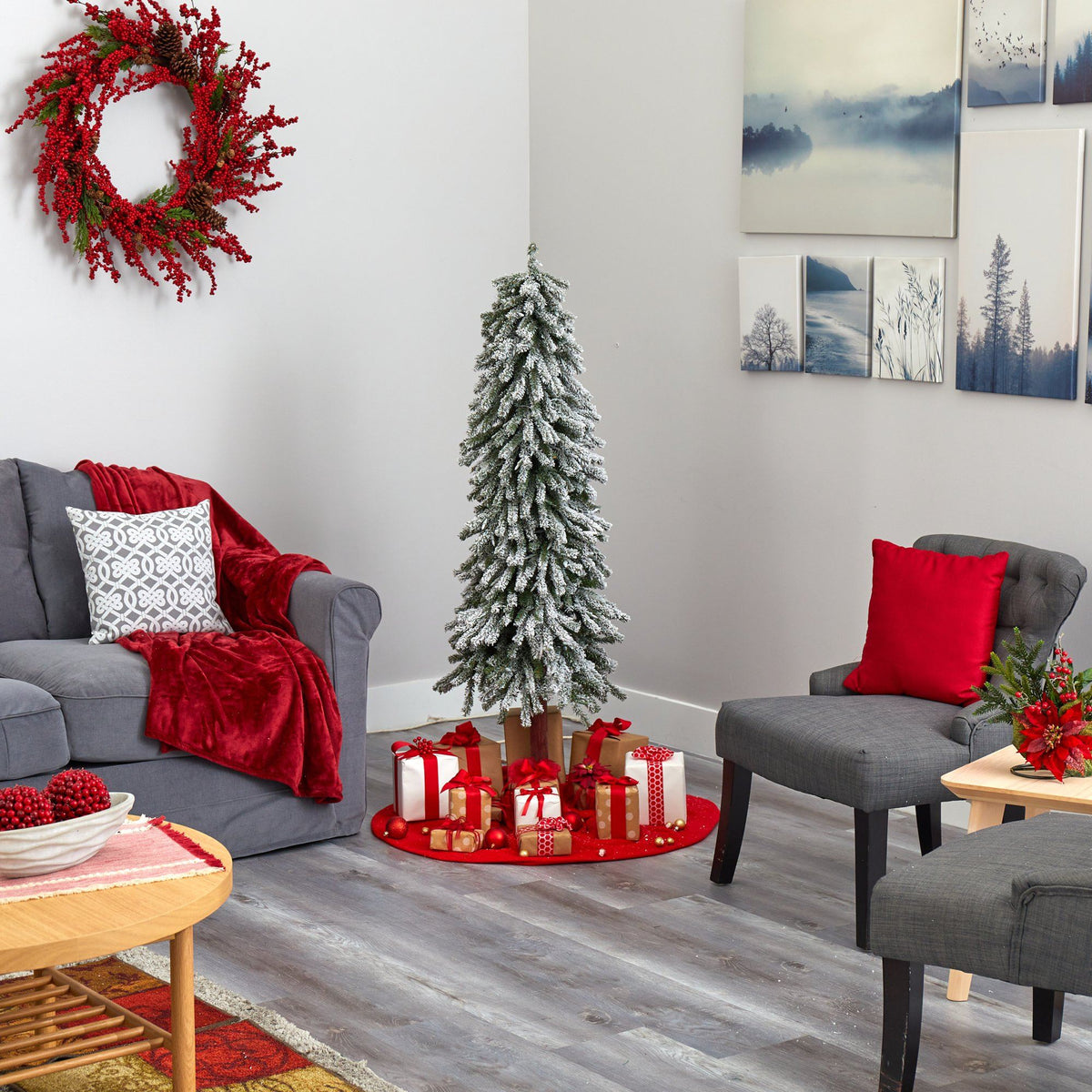a living room with a christmas tree and a couch