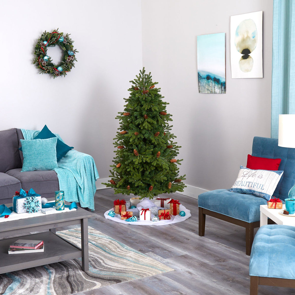 a living room with a christmas tree and a couch