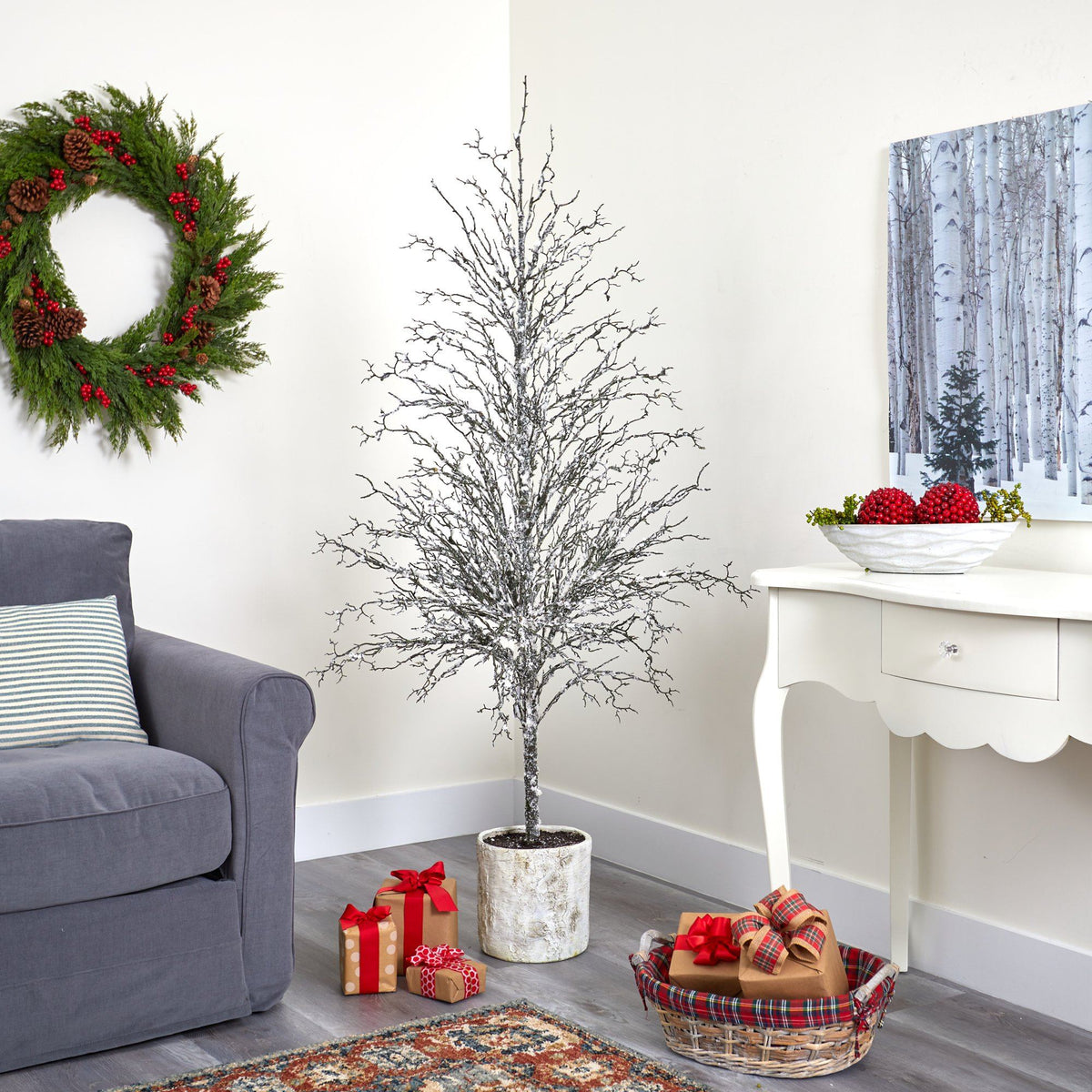 a living room with a couch and a christmas tree