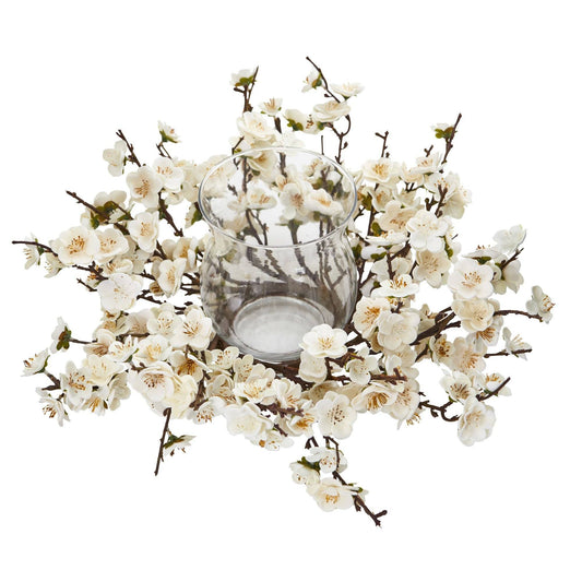 a vase with flowers around it