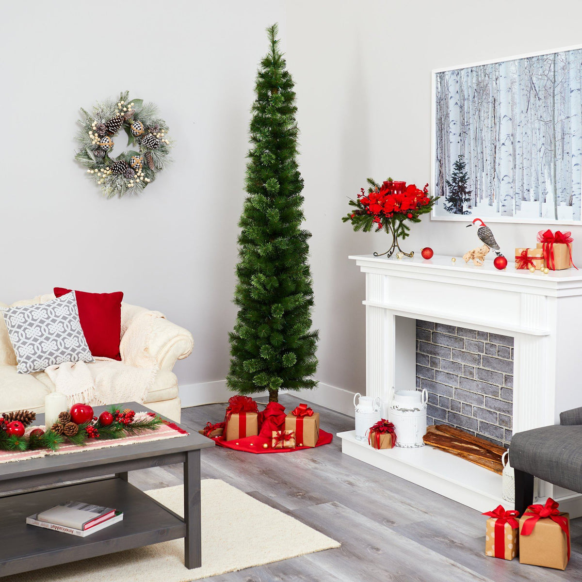 a living room with a christmas tree and a fireplace