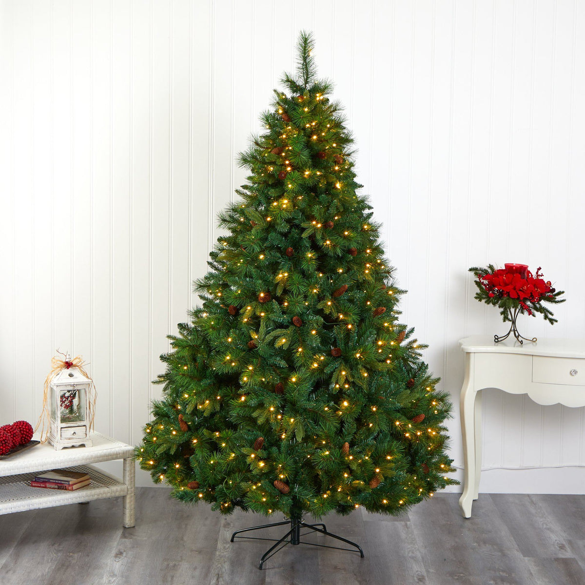 a christmas tree with lights and a table