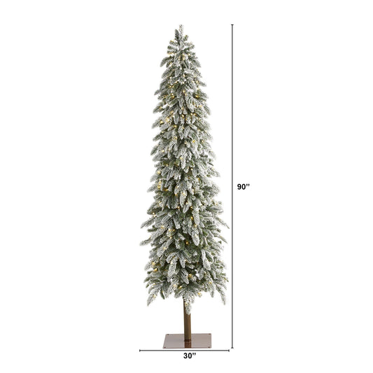 a tall christmas tree with lights