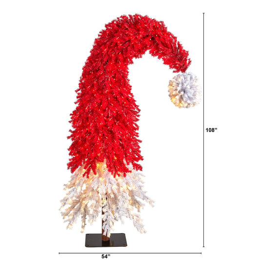 a tall red and white christmas tree